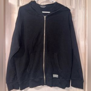 Zip-up sweat shirt.